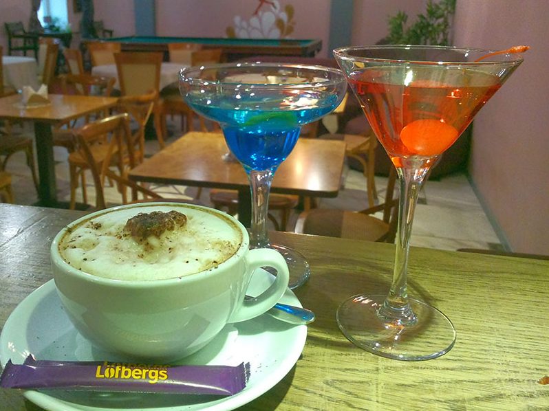Cappuccino and cocktails on a table in the Bar Lounge